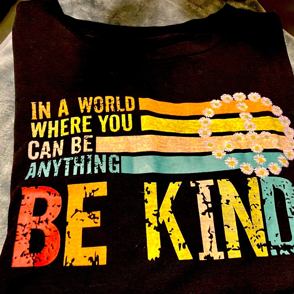 Women’s colorful “Be Kind” T-shirt (size 16).